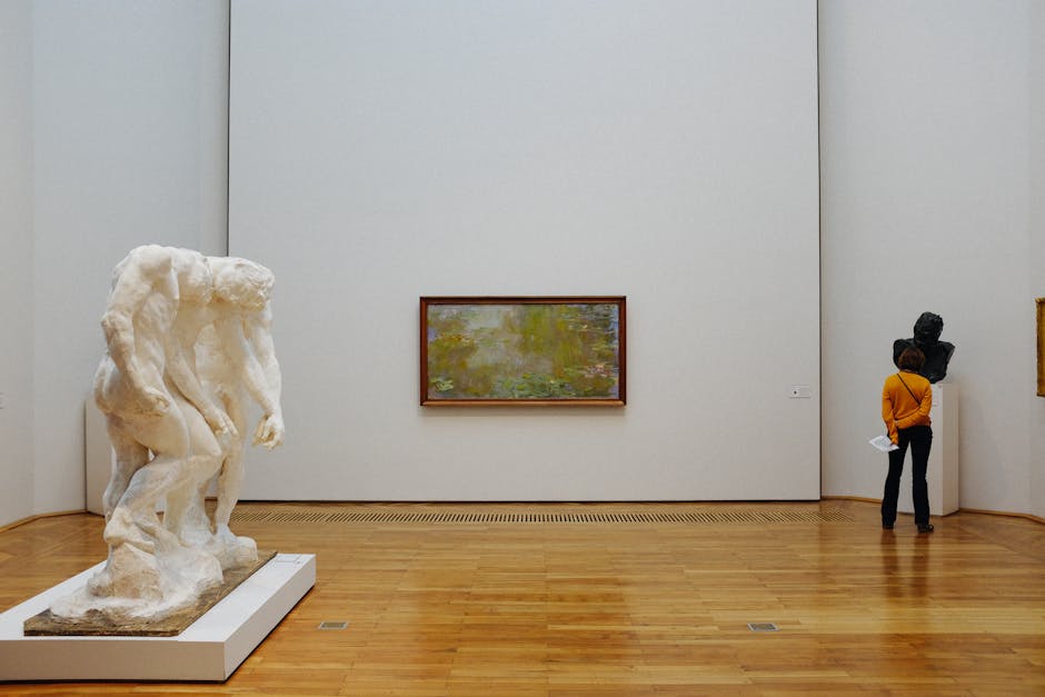 Museum gallery with sculpture